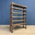 Old wooden rack originating from a shoemaker's workshop in Nijmegen, circa 1920. The wooden rack is mobile thanks to the...