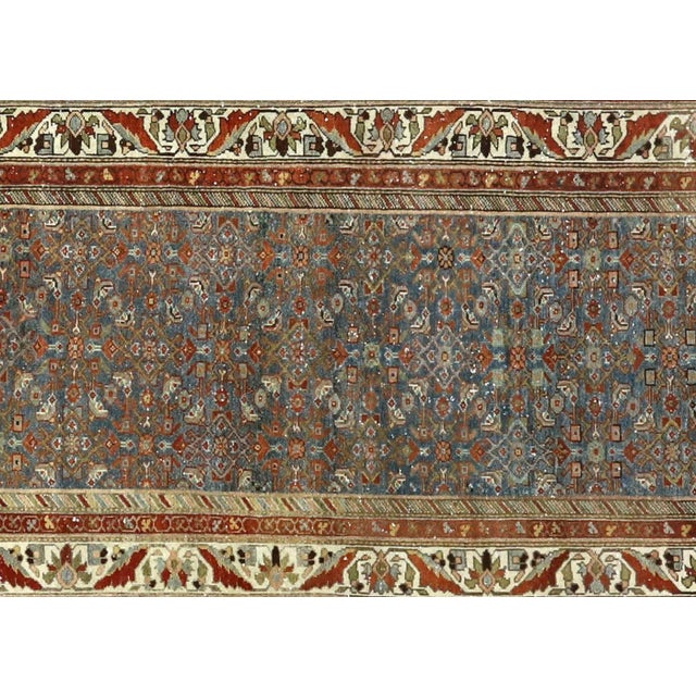 1930s Persian Melayer Runner. Hand woven in the Hamadan region of Iran. Distressed and refinished in the U.S. The Persian...