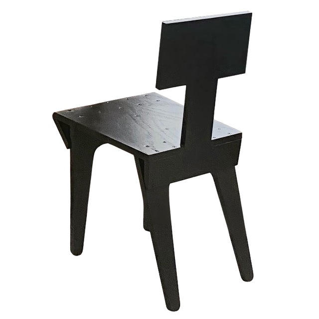 Constructivist chair Attributed to Nathan Lerner, made in the USA. Crafted from plywood and steel with a sleek semi-gloss...