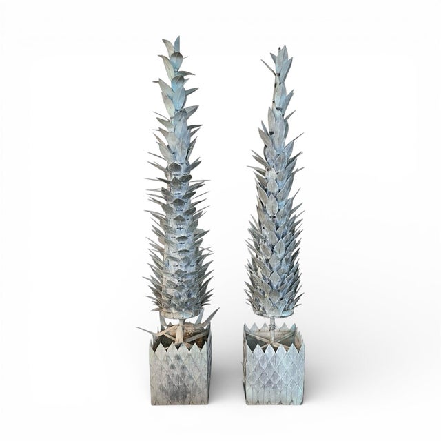 A fabulous pair of large, old potted trees in verdigris metal. The dusty blue/green color and texture are sublime, as is...