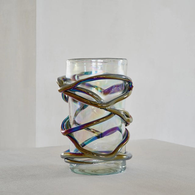 This is a very unique and playfully designed glass vase made by a skilled Murano glass workshop in Venice Italy. There is...