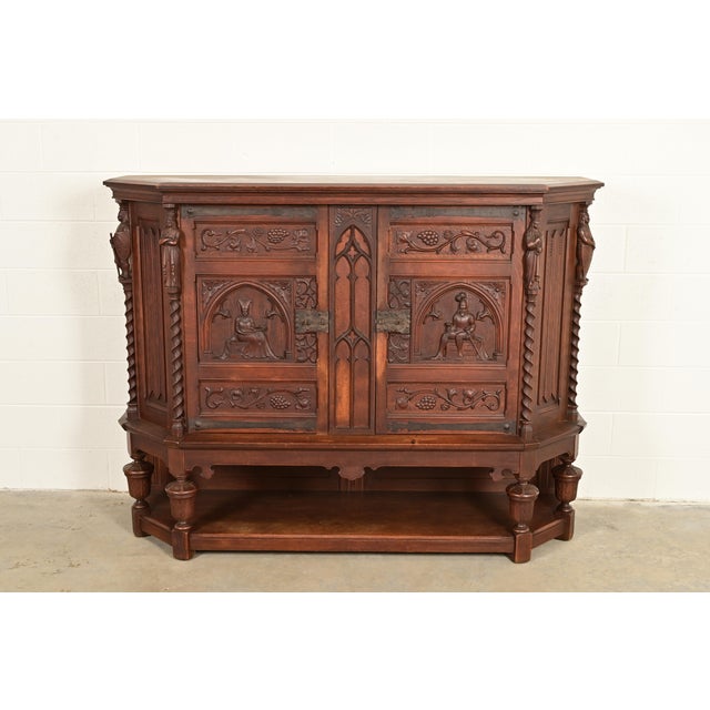 A gorgeous antique French Gothic Revival or Renaissance Revival sideboard or bar cabinet France, Late 19th Century Oak,...