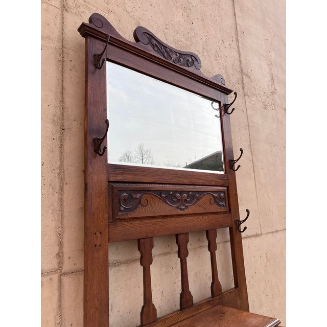 English Antique Mahogany Hall Stand English Antique Hall Stand in Mahogany. The hall stand has beautiful carved...
