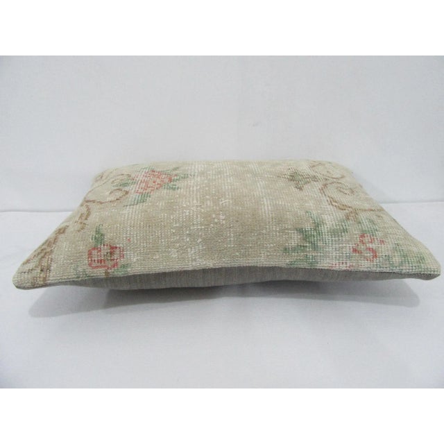 Decorative pillow cover made from a vintage Turkish handknotted rug. Backed with good quality cotton fabric. Pillow...