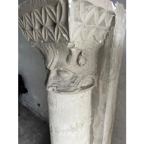 Introduction a striking pair of monumental sculptural columns by belgian artist walter de buck , executed in plaster....