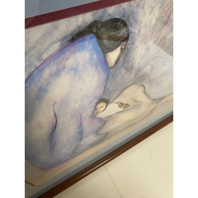 Beautiful reproduction lithograph of RC Gorman's artwork titled Tazzie's Baby. It is sized 32" x 27". It includes a...