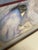 Beautiful reproduction lithograph of RC Gorman's artwork titled Tazzie's Baby. It is sized 32" x 27". It includes a...