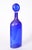 Mid-20th century cobalt blue with gold fleck Murano glass decanter. The decanter is in excellent condition, maker's mark...