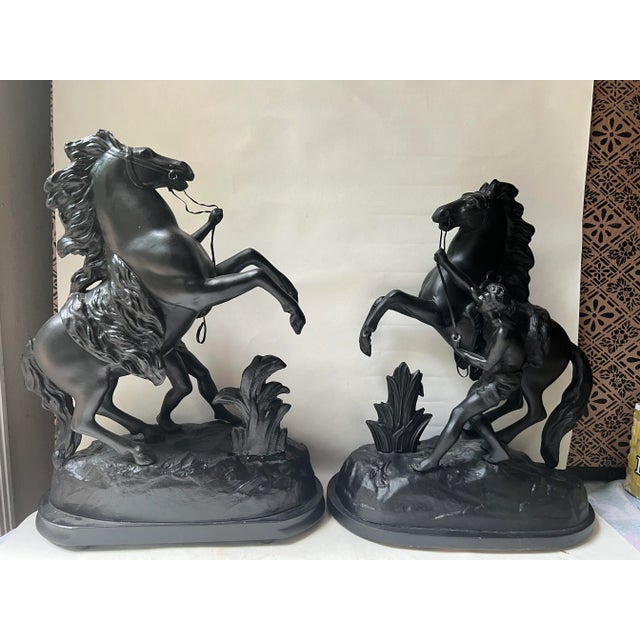A Pair of Vintage Spelter Marley Horses of black bronzed Patination on wood bases. Spelter Figural Statue of Man & Rearing...