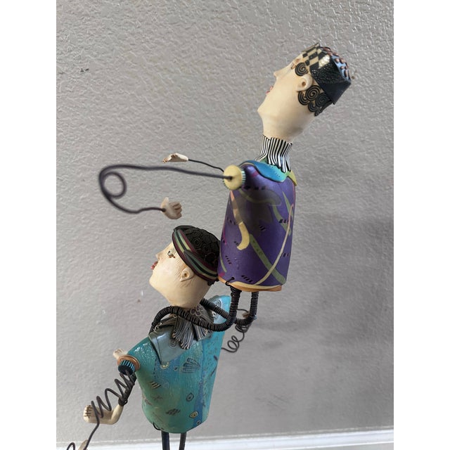 “Unicycle” (from the Jesters Series), 2005 Mixed media sculpture (steel armature & polymer clay), 28 in. high Artist-...