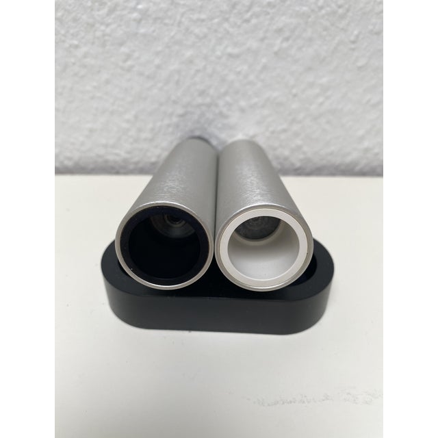 A refined and collectible salt and pepper grinder set designed by the acclaimed Danish duo Rud Thygesen and Johnny...