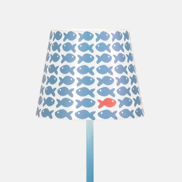 Elevate your Poldina lamp with our new collection of twelve vibrant graphic shades, curated by Federico de Majo. These...