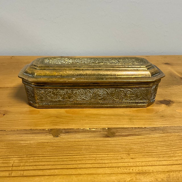 Discover the timeless allure of this antique betel box, a beautifully crafted piece steeped in history and tradition. Once...