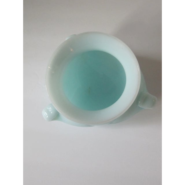 Gorgeous Pearlescent Blue Art Glass Vase with 3 handles. This vase does not sit flat, it was blown to sit on an angle. A...