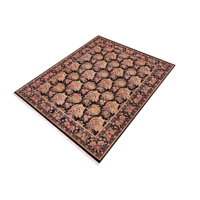 Elevate your space with this exquisite Pak Persian William Morris Hand Knotted Wool Rug, a masterpiece that blends...