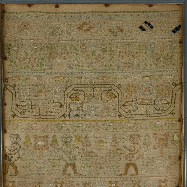 Charles II Band Sampler, dated 1672, by E.Y. The sampler is worked in silk threads on a linen ground, in a variety of...