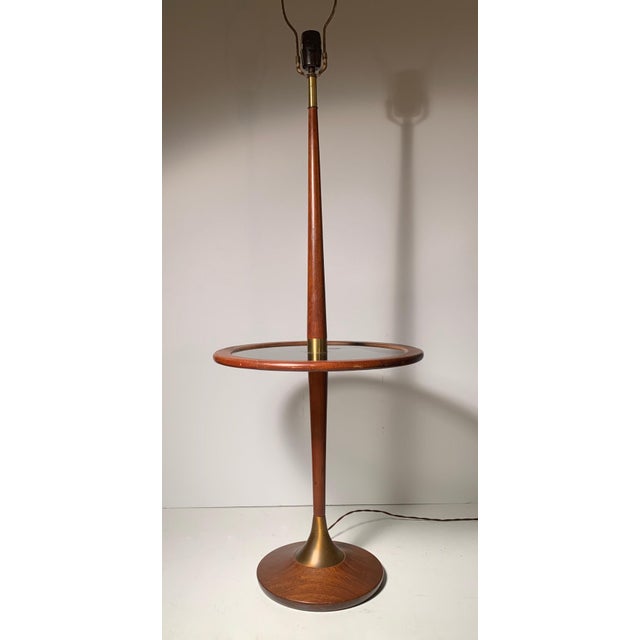 Vintage Modeline wood floor lamp with tinted glass table top. In the style of Adrian Pearsall.