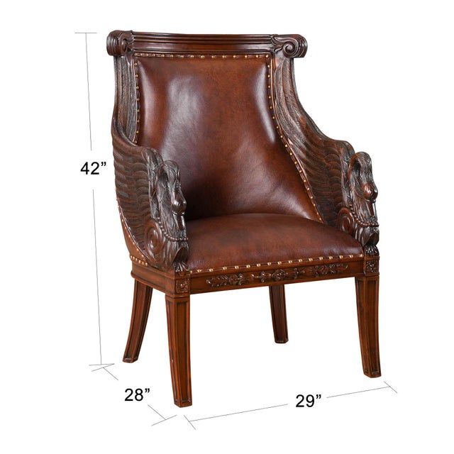 This high end Leather Swan Arm Chair from Niagara Furniture is impressive with solid mahogany hand carved details as well...