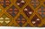 This is a vintage Turkish Oushak rug from the Mid 20th Century. The piece was hand-knotted.