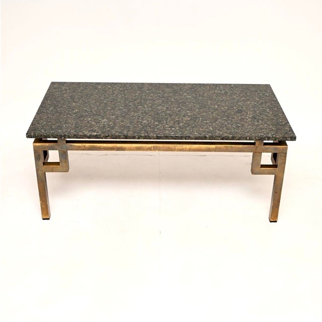 A stylish and extremely well made vintage French brass and marble coffee table, dating from around the 1960’s. It is of...