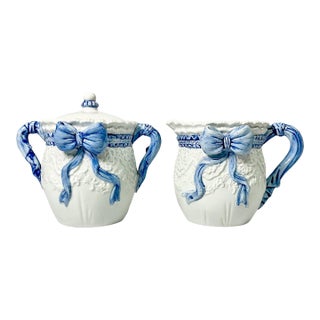1980s Vintage Chippendale Hollywood Regency French Blue Ribbon & Bow Creamer and Covered Sugar Bowl - 2 Piece Set, After Fitz & Floyd For Sale
