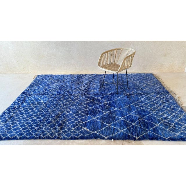 Embark on a journey of understated elegance with our Moroccan handmade Beni M'Rirt rug, a seamless fusion of contemporary...