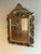 This 18th-century giltwood mirror has been exquisitely crafted with a richly gilded frame and intricate carved detailing....