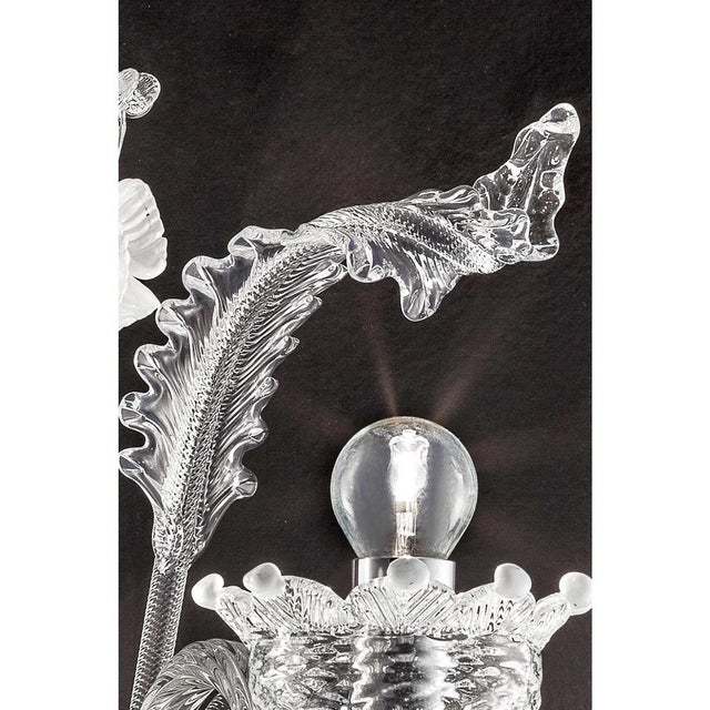 Venetian floreal murano glass chandelier with transparent leaves and flowers pinched by hand full of precious white...