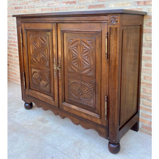 1930s Spanish Carved Oak Cabinet with Geometric Panels, Early 20th Century For Sale - Image 5 of 15