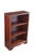 Mid-20th Century Victorian style bookcase. Features a mahogany frame with reeded columns along the front and two fixed...