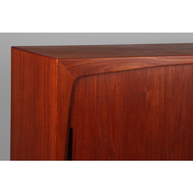 Harry Østergaard sideboard in teak. Sliding doors, drawers and doors. Made in the 1960s This piece is attributed to the...