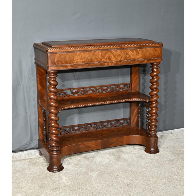 This burl mahogany planter has classic and robust lines, typical of the restoration style The top, with beaded edges, has...