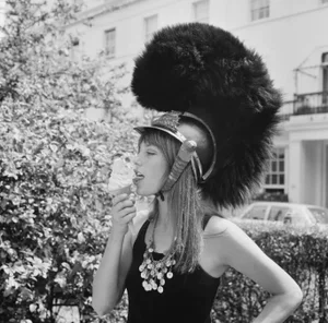 Jane Birkin Eating Ice Cream - Archival Black and White Photograph Print by Getty - 12x12
