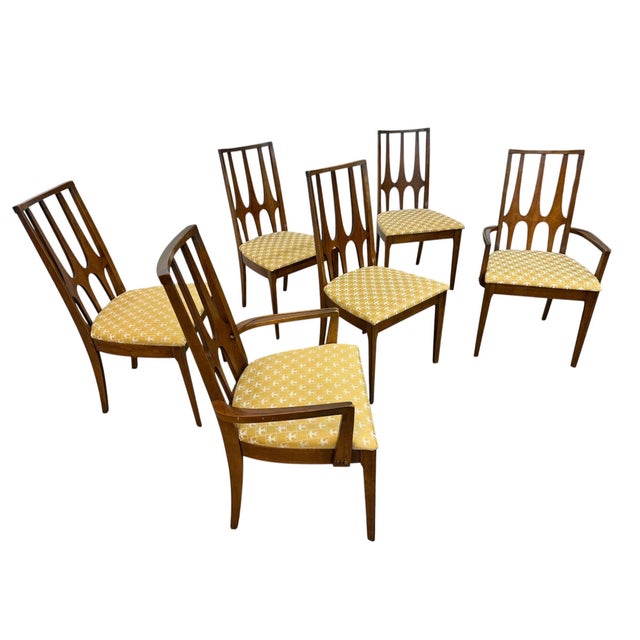 Make a statement with this stunning set of six mid-century modern Broyhill Brasilia walnut dining chairs, circa 1960s....