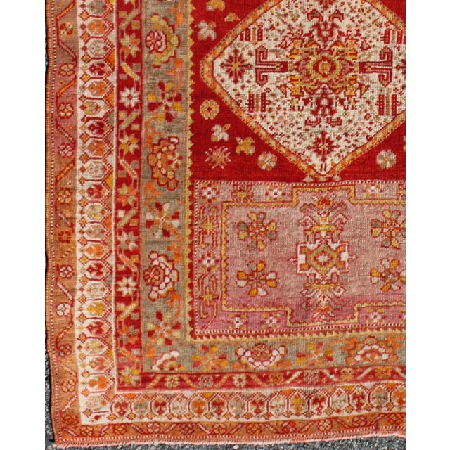 Turkish Antique Turkish Oushak Rug With Colorful Flowing Floral and Geometric Motifs For Sale - Image 3 of 7