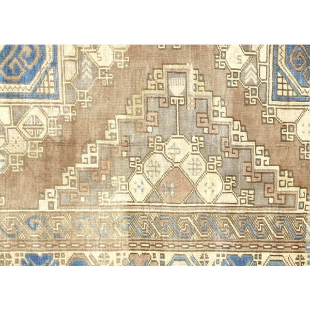 1960s Turkish Oushak Rug. Handwoven with wool on wool foundation in the Oushak region of Western Turkey. The Anatolian...