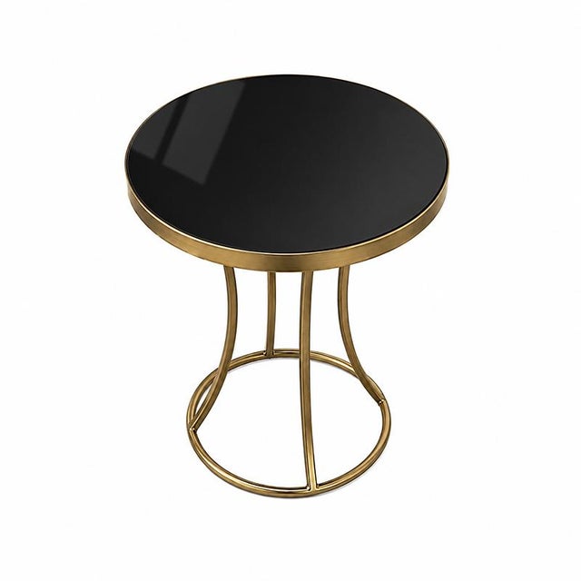 Round coffee table with a brass frame and a round black glass top. Dimensions (DxH): 60 x 70 cm