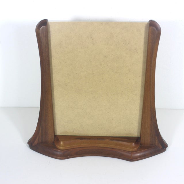 Gorgeous art nouveau style black walnut wood table top photo frame with non glare glass. Holds an 8”x10” photo Vertically....