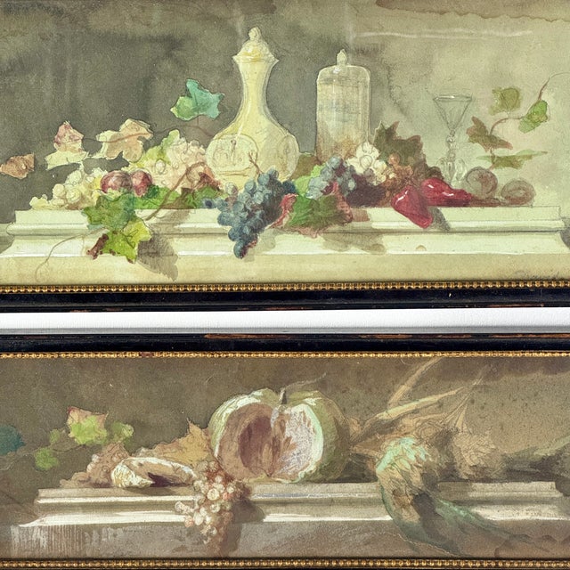 A gorgeous pair of small watercolors depicting foliage and fruits on marble pedestals. They are both signed with David and...