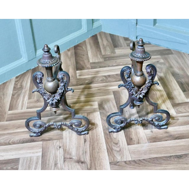 A Pair of Decorative French Brass Andirons or Chenets This is a very attractive pair of French Brass Andirons, the...