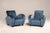 Pair of art deco armchairs in blue velvet with black borders. The armchairs have been reupholstered with hand-tailored...