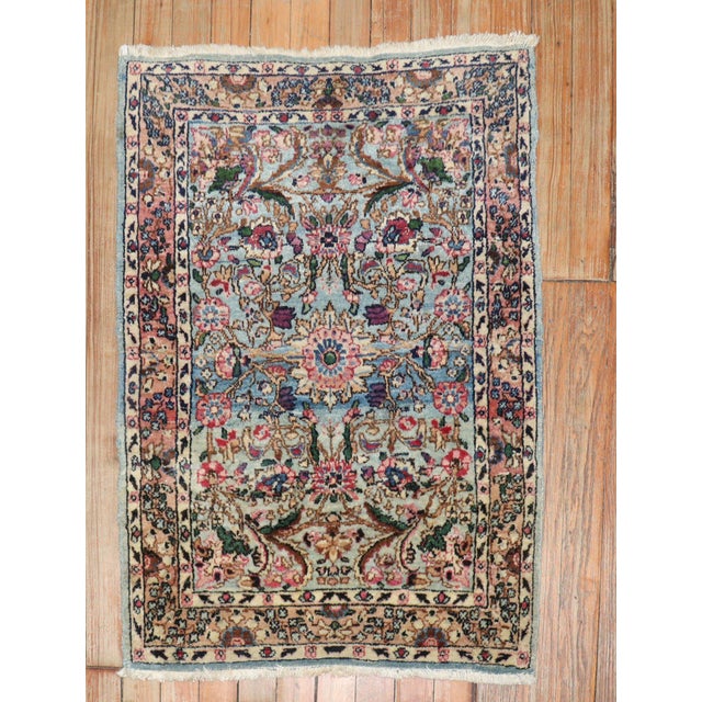 An early 20th-century Persian Kerman traditional mat-size rug. Measures: 2' x 2.9". The province and city of Kerman in...