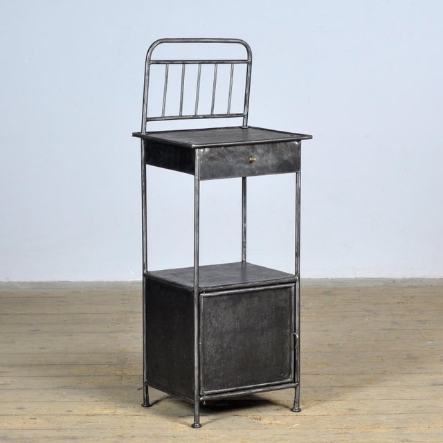 Bedside table made of iron from a hospital in Budapest. Stripped to the metal and polished. Circa 1910.