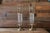 Striking vintage pair of Chapman Manufacturing Company brass and glass hurricane candle holders, dated 1985. These...