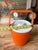Up for consideration is a beautiful vintage orange plastic ice bucket with a white lid. This would look lovely in your...