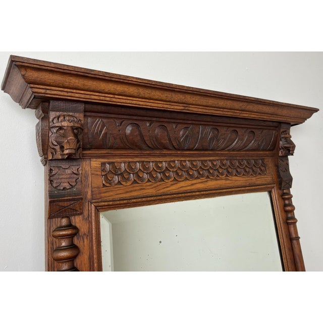 Bring timeless French elegance into your home with this Antique French Oak wall mirror . Featuring an impressive carved...