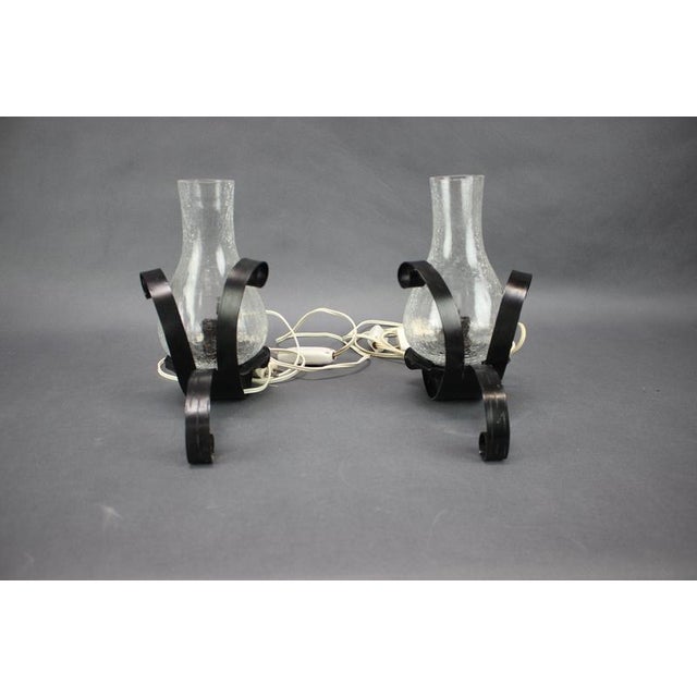 Rare and highly decorative pair of 1950s table lamps from czechoslovakia, featuring distinctive clear crackle glass shades...
