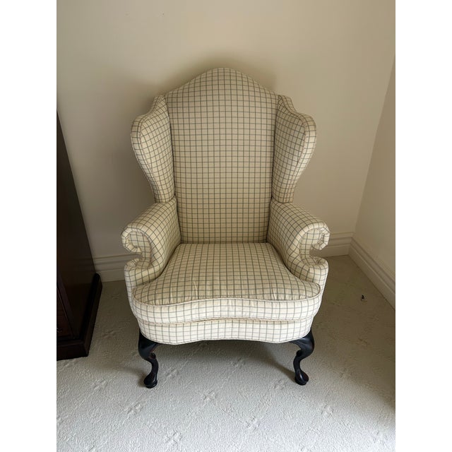 This Queen Anne style wingback chair is a timeless statement piece, crafted from rich mahogany and designed with graceful,...