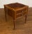 This is a new Mahogany Serpentine End Table by Leighton Hall. It features a serpentine shape and round fluted legs. It has...