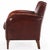 A classic leather club chair featuring warm, aged leather upholstery. The generous proportions, straight back, gently...